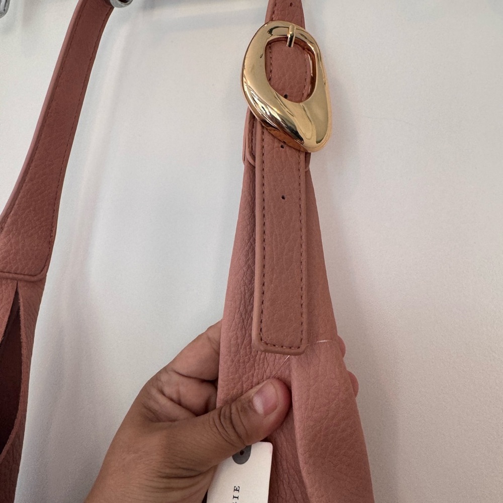 Anthropologie pink Love Knot Shoulder Bag with Gold Buckle. NWT